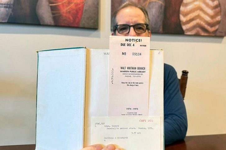 A man returns an overdue baseball book 50 years late to a Detroit library.